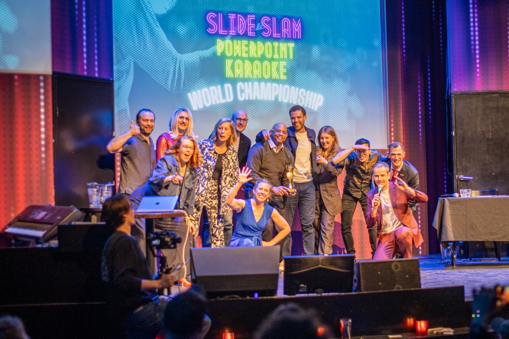 Improv Corner – Playing The Favourite – INTERVIEW With Slide Slam: World Championship of PowerPoint&nbsp;Karaoke